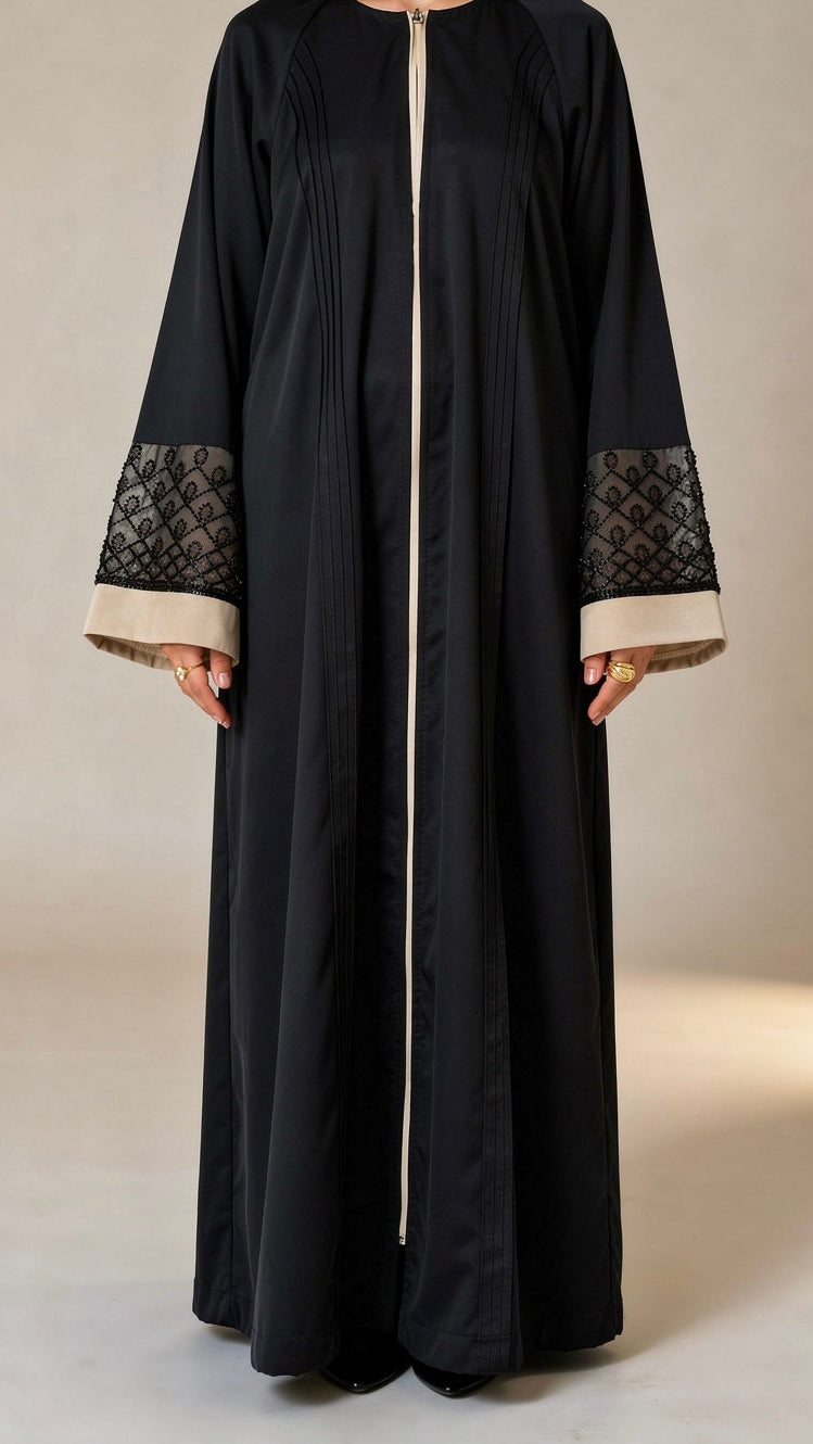 Abaya Noor en tissu Nidah avec dentelle et sequins aux manches